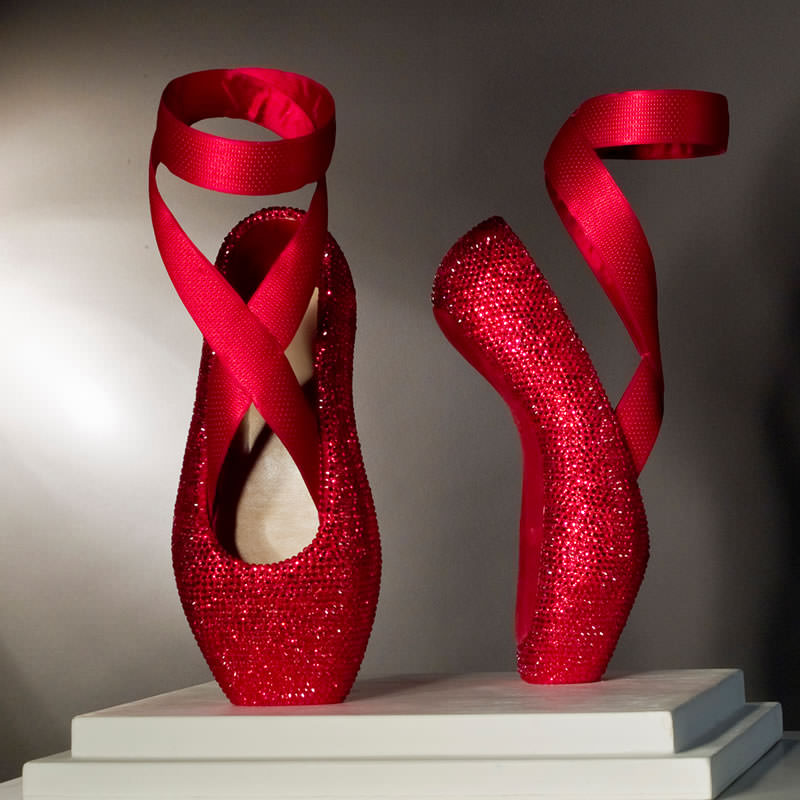 Sculpture with red shoes